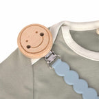 Lassig Soother Holder Wood/Silicone Tiny Smile powder blue