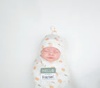 Lulujo Hello World Swaddle & Hat Set - Peaches