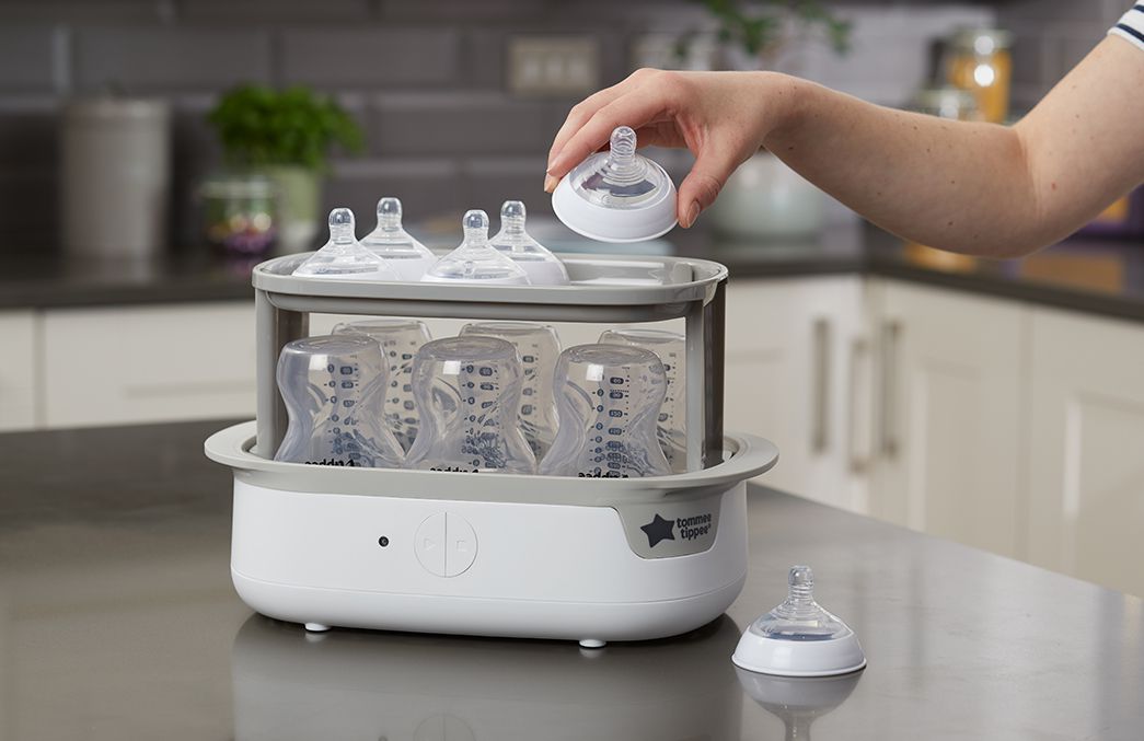 تومي تيبي - معقم بخار كهربائي- أبيض